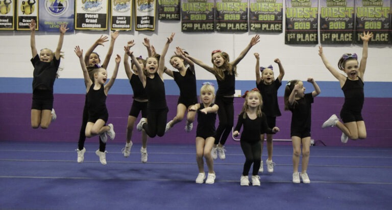 all star cheer cheerleading in Kelowna team stunting pyramid youth sports girls female jumps